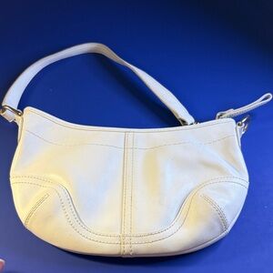 Coach, Elegant Cream wristlet/small clutch Bag.